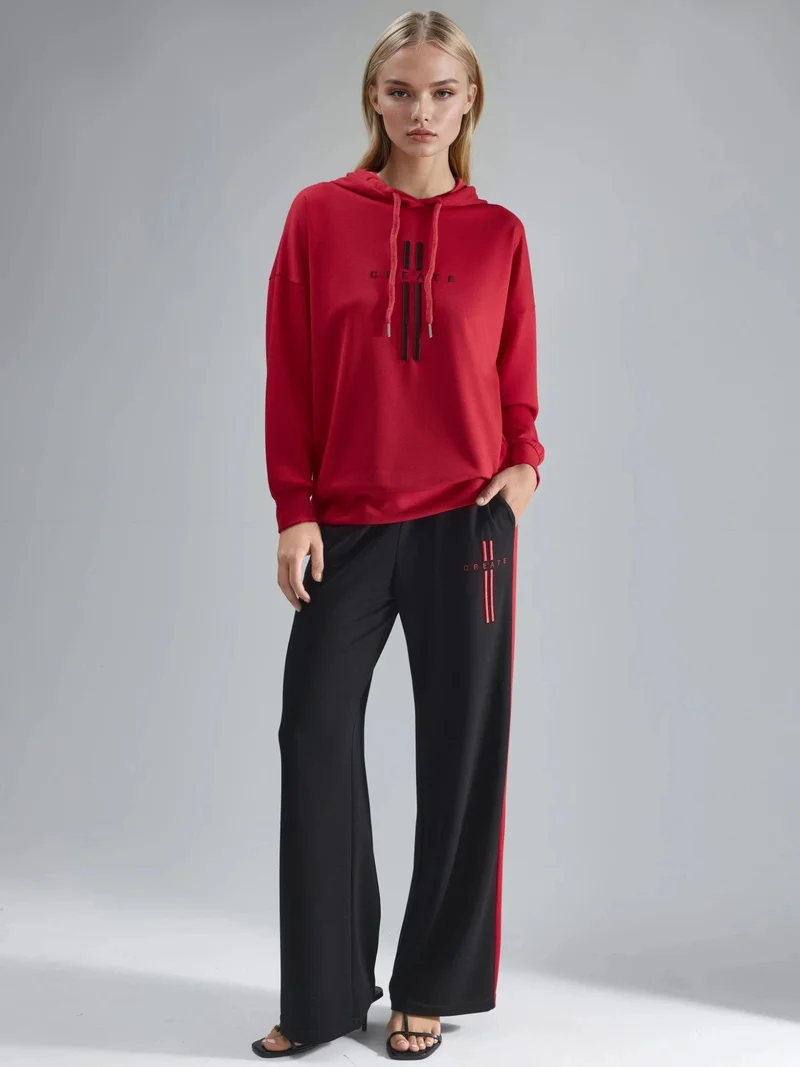 هيكاب طقم سويت شيرت بغطاء رأس مودال وبنطلون بتفاصيل مخططة من مجموعة بيرسان